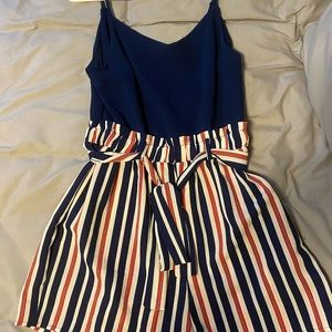 Francesca’s romper, size medium, navy, with white & red stripes. Never worn